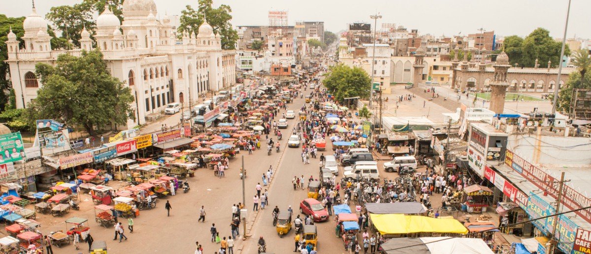 india street view with people and buildings