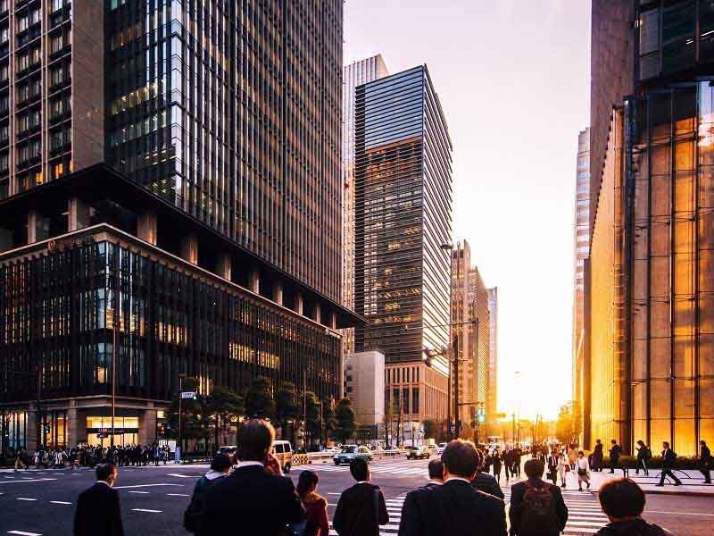 People leaving from the office at evening after work