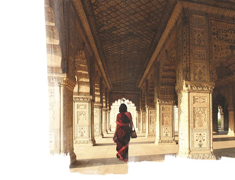 Interior view of Red Fort while woman walking in the Fort Delhi