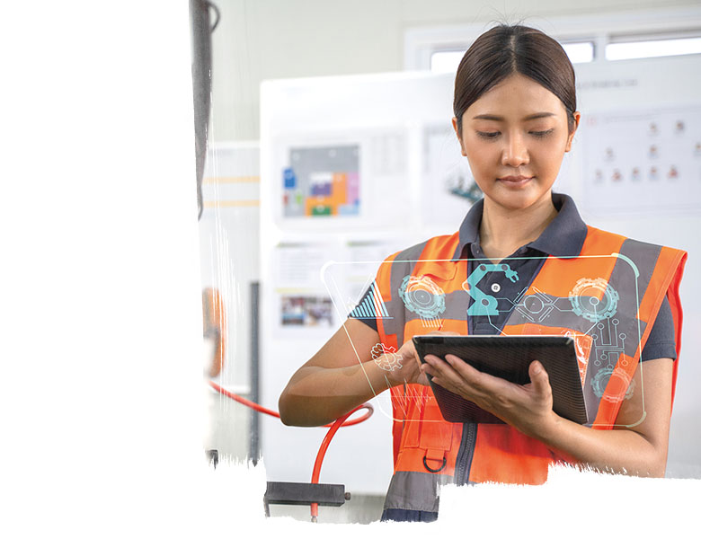 A lady with a lanyard walking through a data centre facility