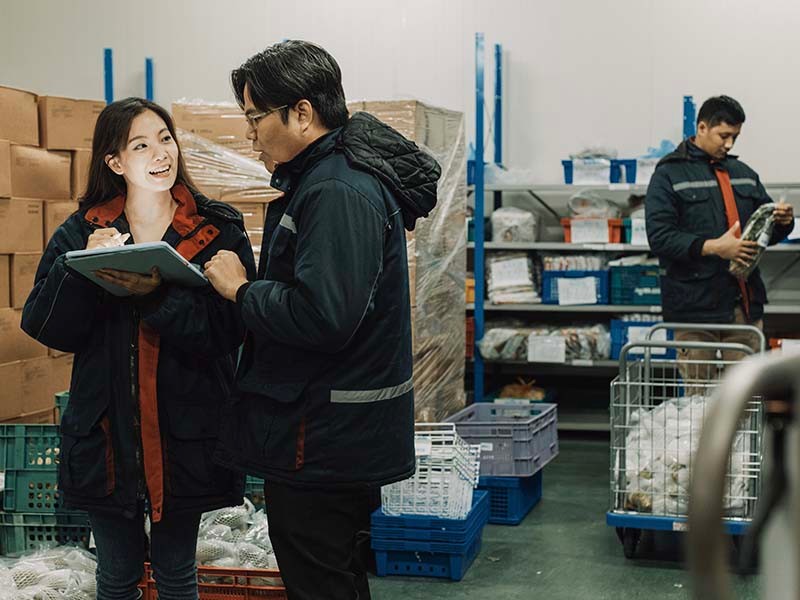 Employees are working in cold storage