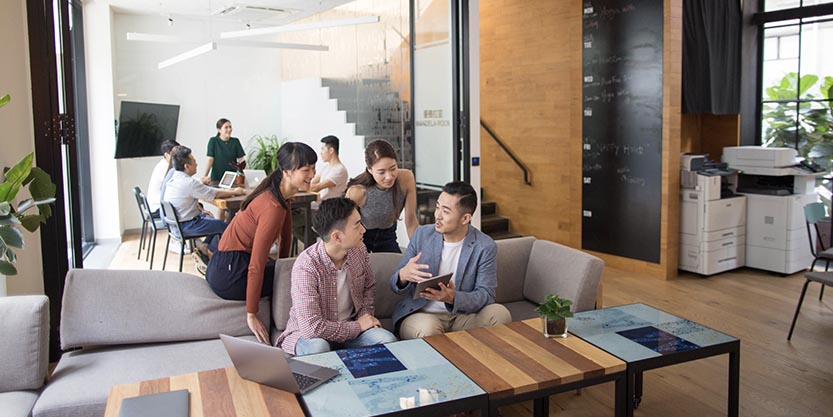 people discussing at office