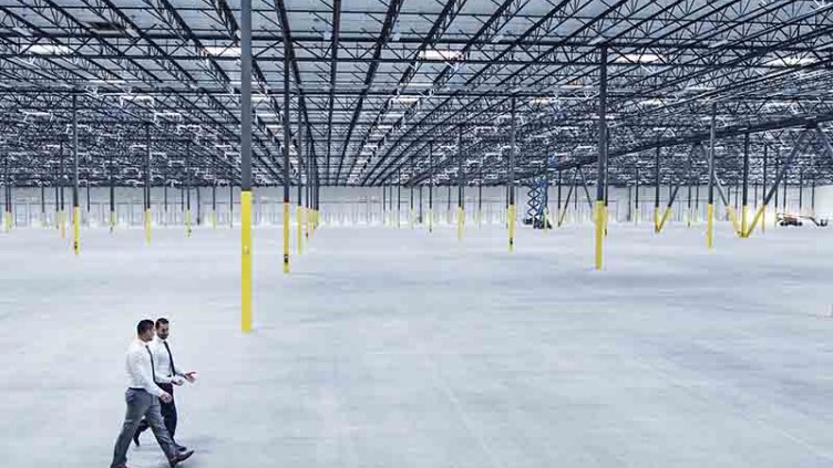 Men walking inside the warehouse