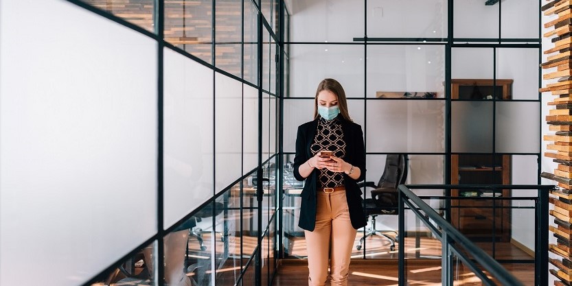 Women standing in an office