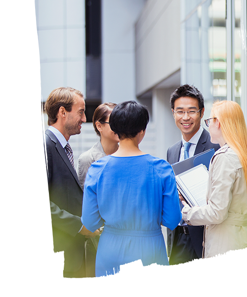 Employees talking to each other inside the office premises